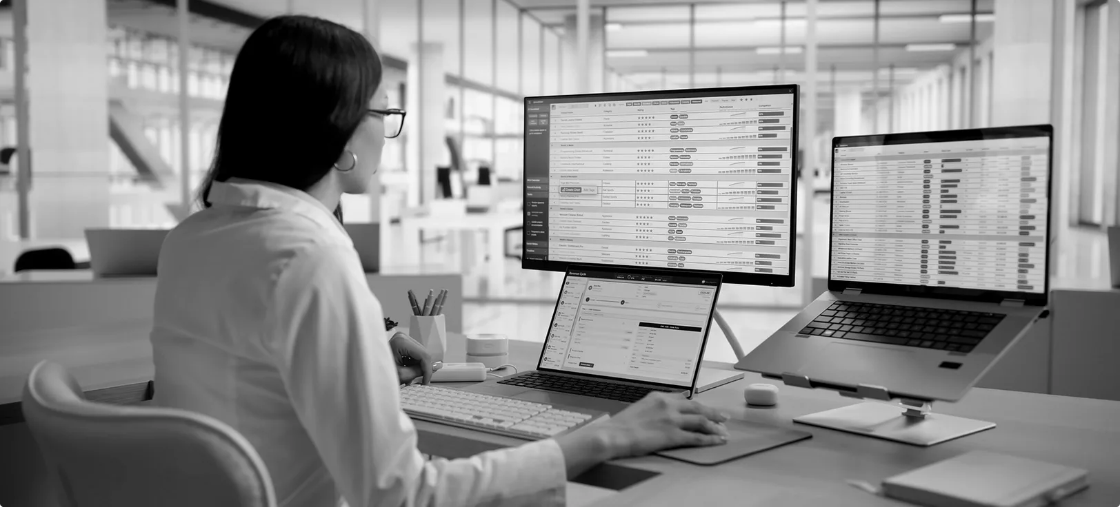 A doctor reviewing financial reports at a desk